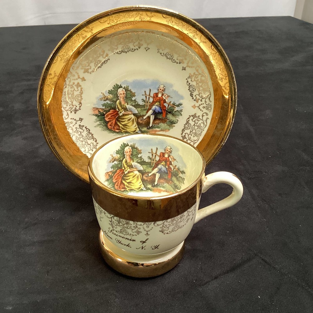 Crest - o- gold warrented  22 k tea cup and saucer  with stand
